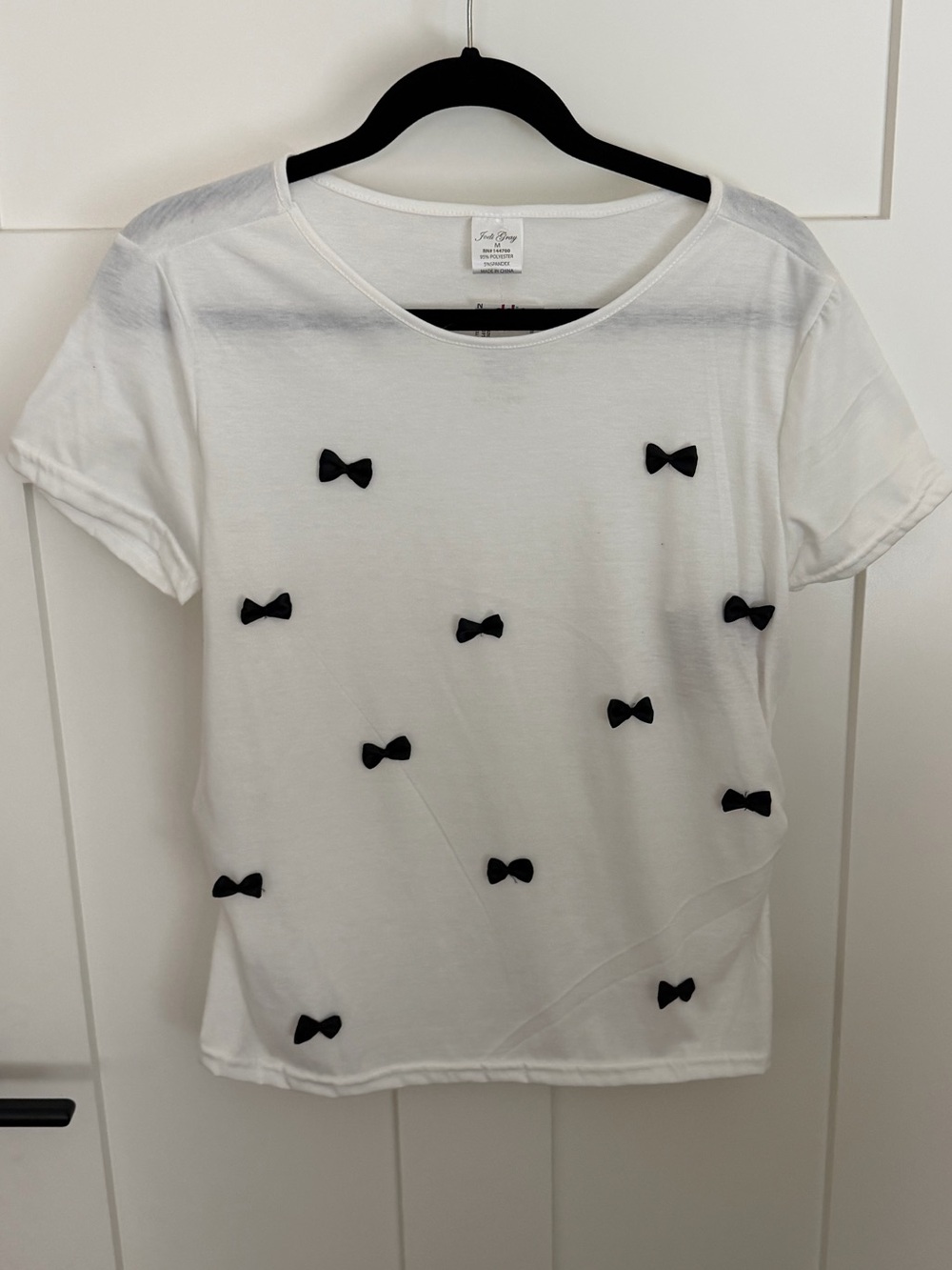 White Short-Sleeve Tee with Black Bow Accents